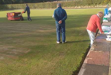 watching a machine on the green