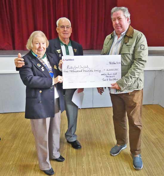 Charity Cheque being presented by Presidents